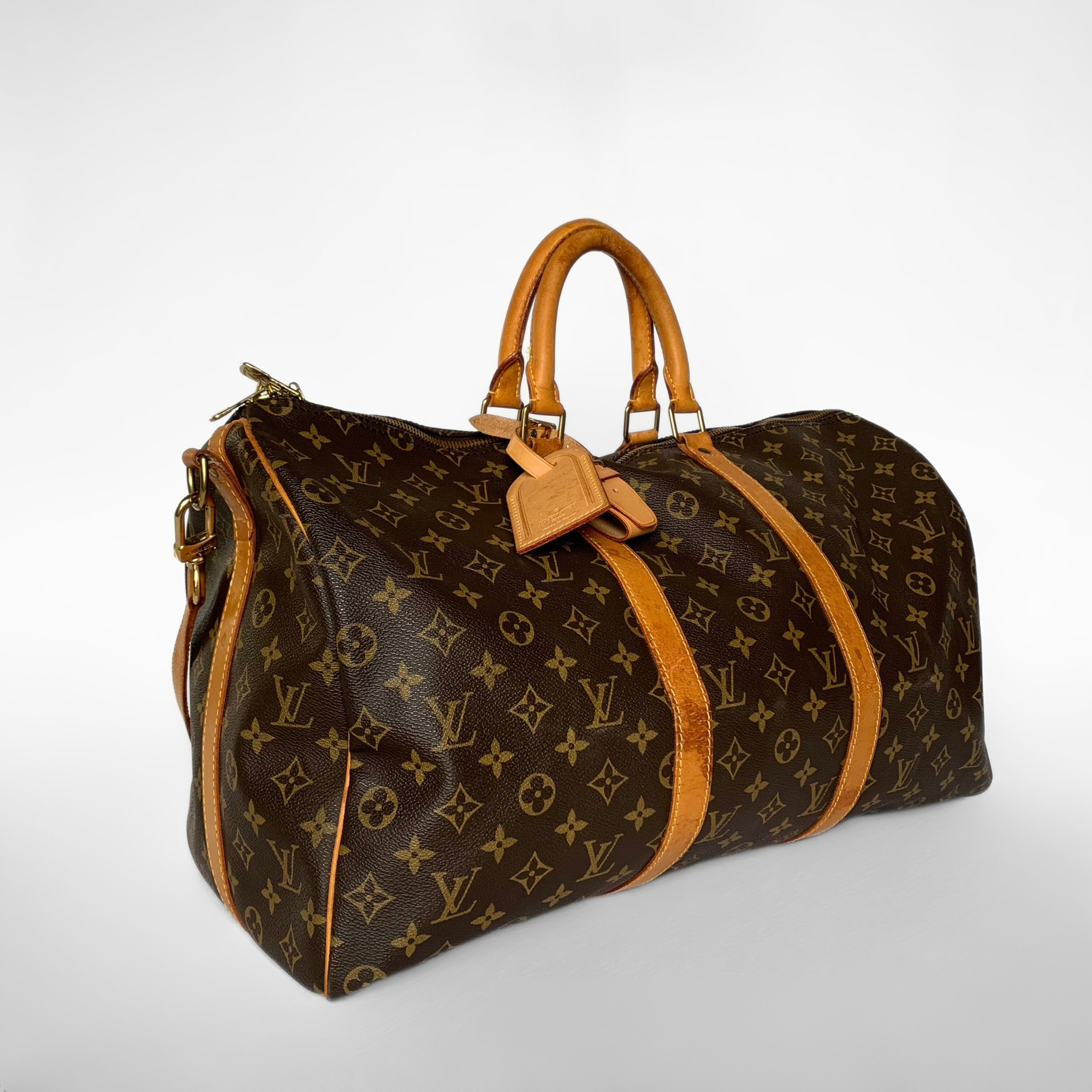 Louis Vuitton Louis Vuitton Keepall 50 Bandouli&egrave;re Monogram Canvas - Travel bags - Etoile Luxury Vintage