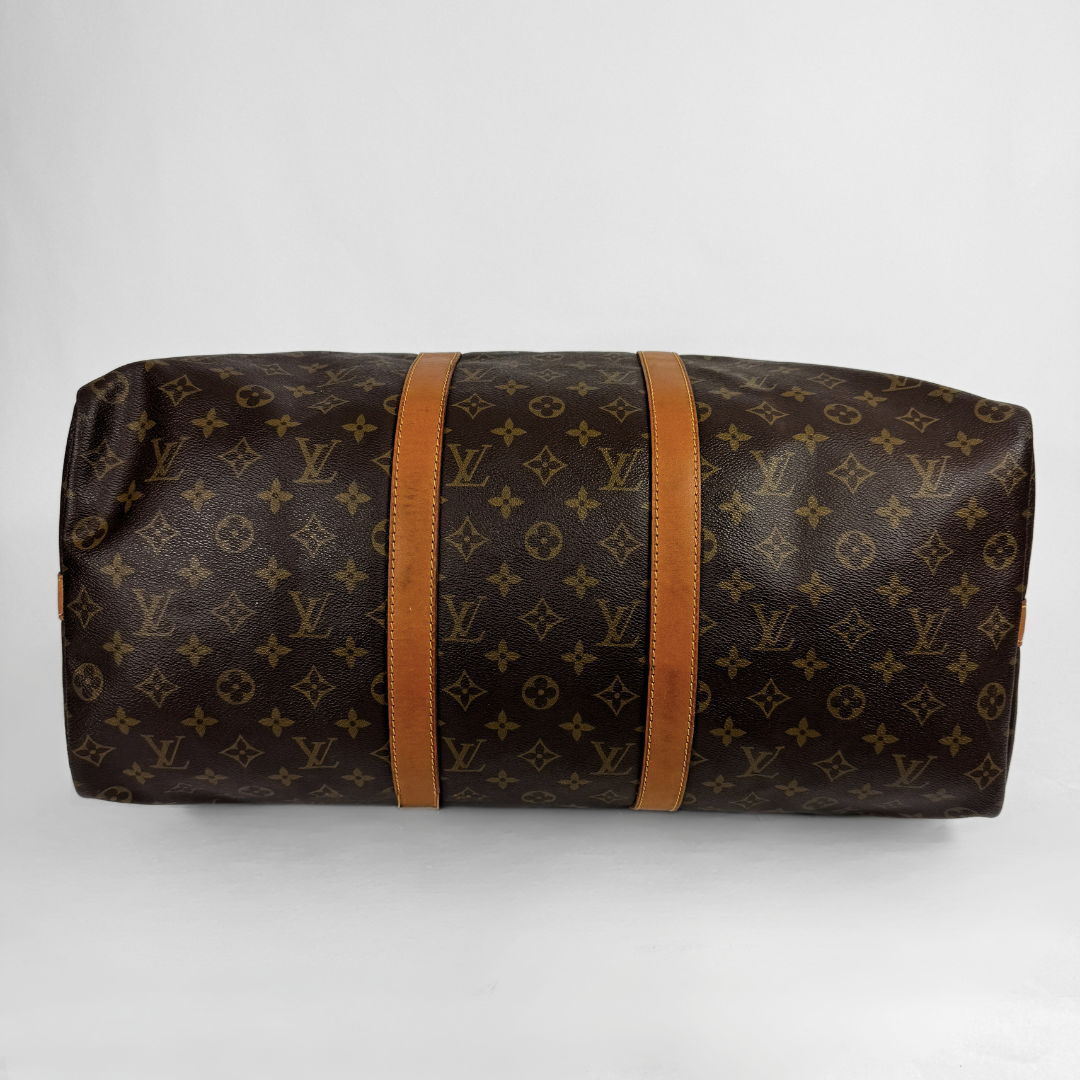 Louis Vuitton Keepall 50 with strap on a white background 