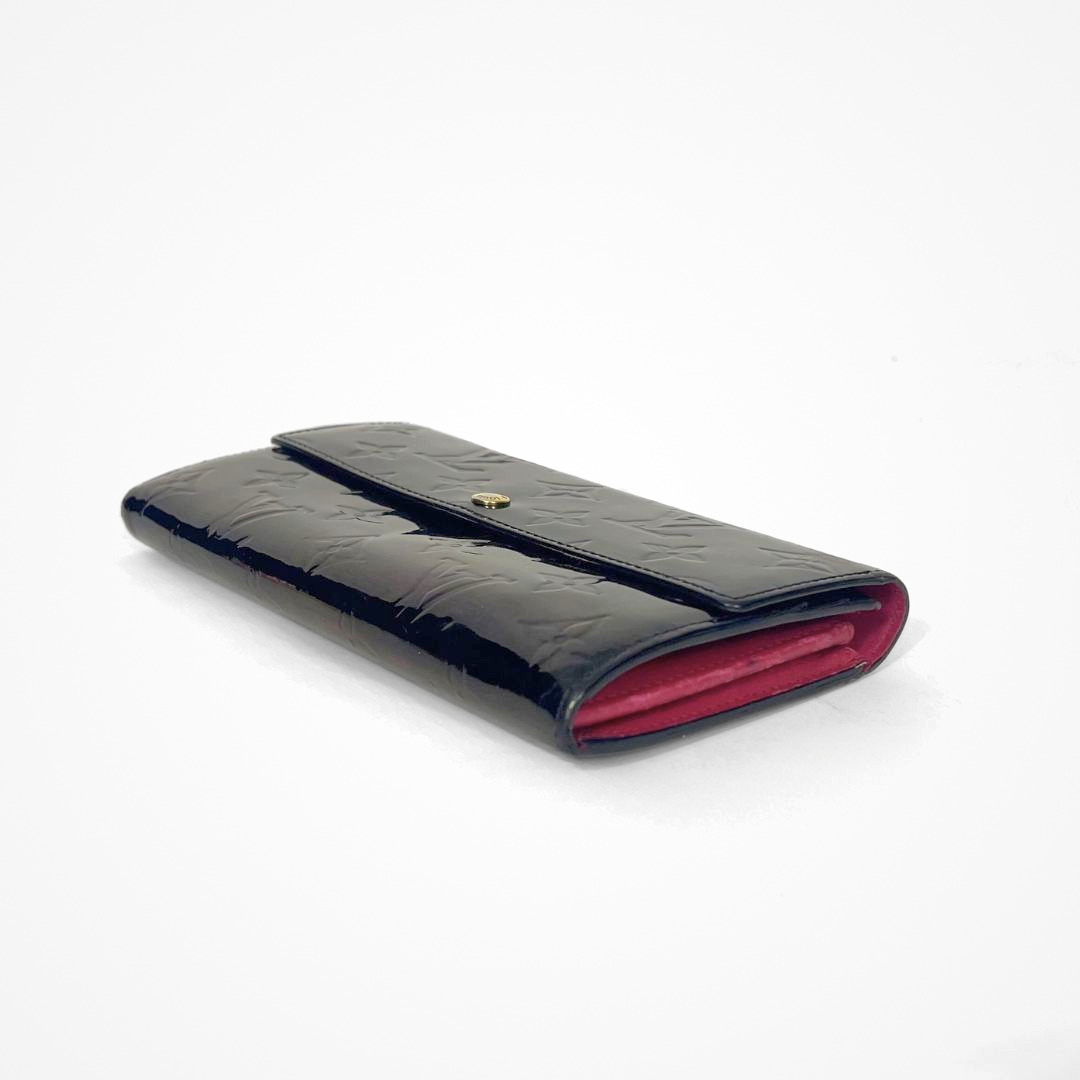Louis Vuitton Vernis Wallet on a white background