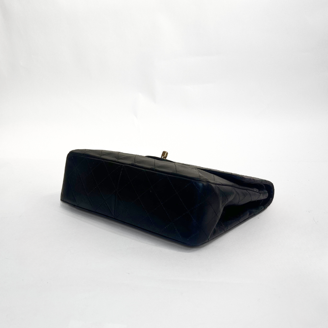 Chanel Classic Flap Bag Medium on a white background