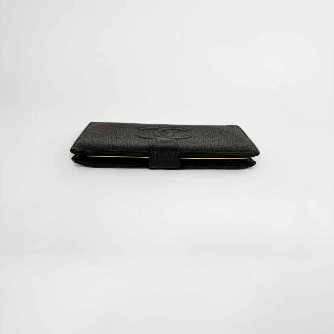 Chanel Wallet large Caviar on white background