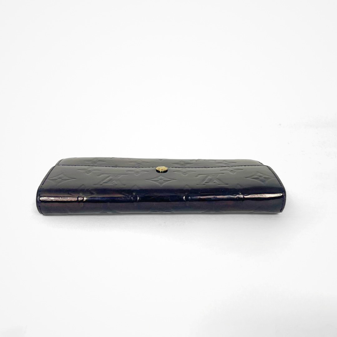 Louis Vuitton Vernis Wallet on a white background