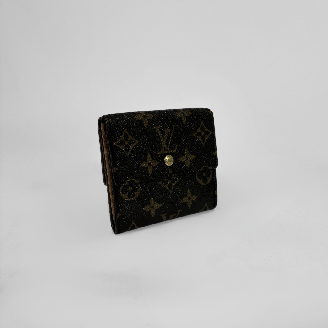 Louis Vuitton Druk Wallet on a white background