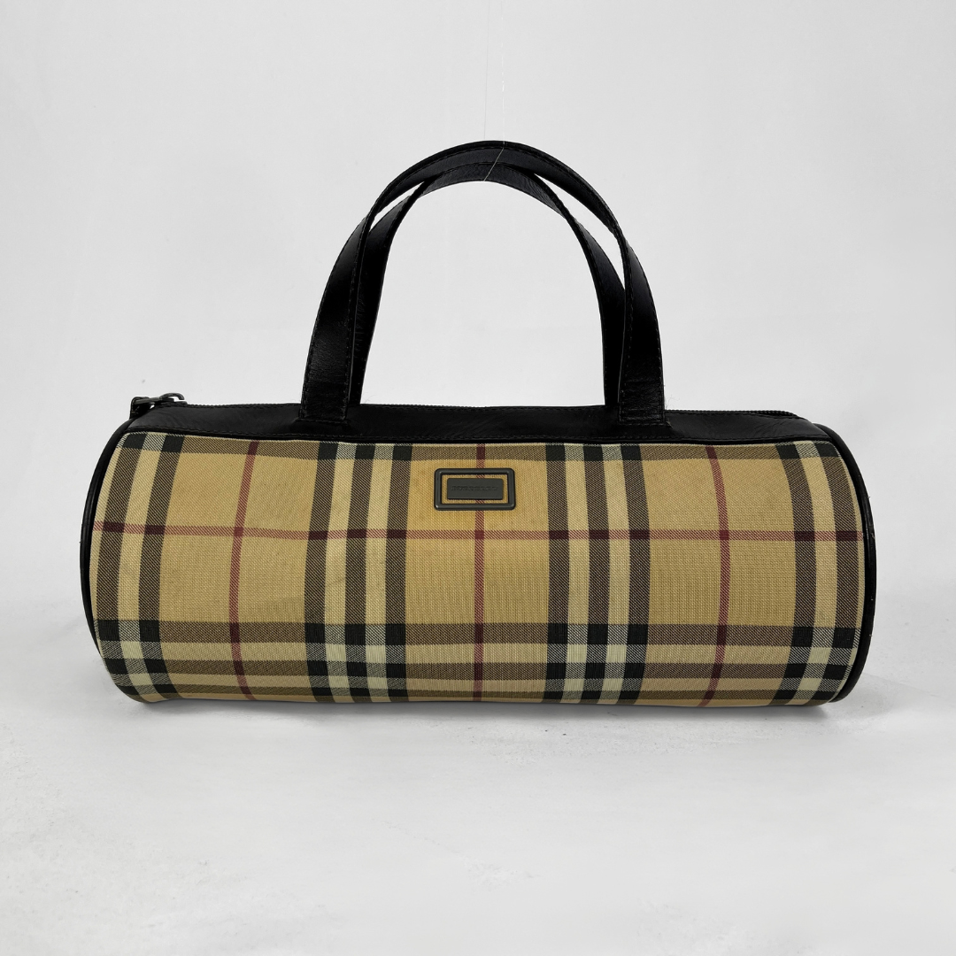 Burberry Mini Barrel handbag in the iconic beige House Check canvas with brown leather trims and details, displayed on a light grey background.