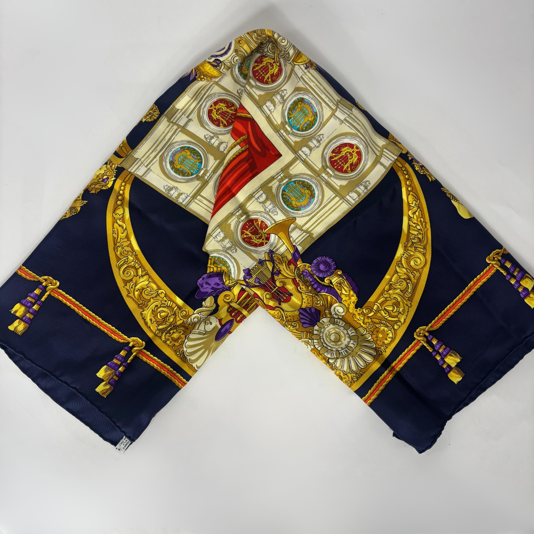 Decorative scarf with intricate patterns on a white background